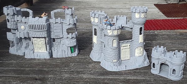 Three thrift-shopped Fisher Price castles primed and masked, ready for the topcoat. Click for bigger photo.