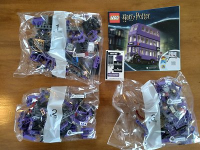 The pieces are divided into packets you open one at a time to get started.  Click for bigger photo.